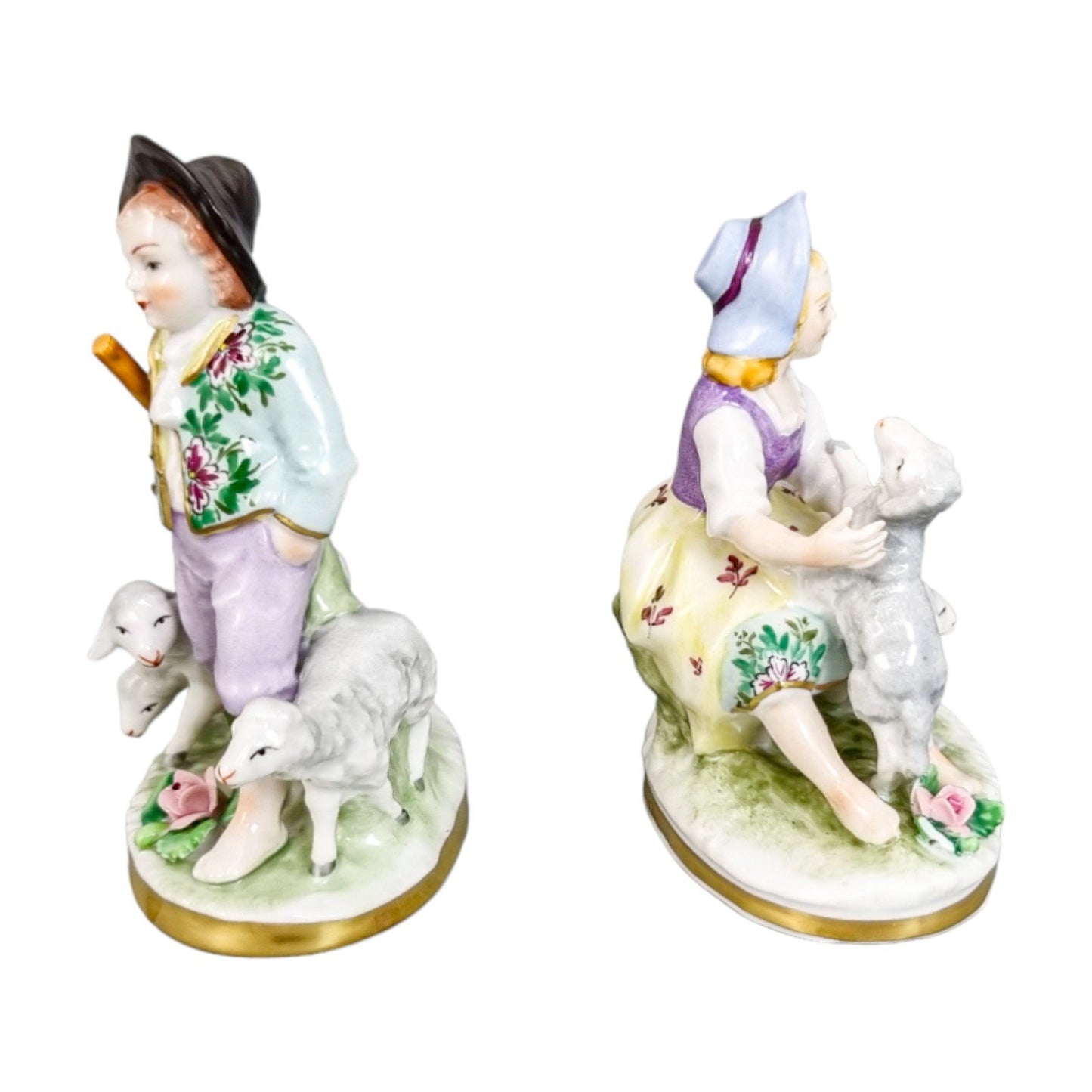 Miniature Sitzendorf porcelain boy and girl shepherds with sheep figurines