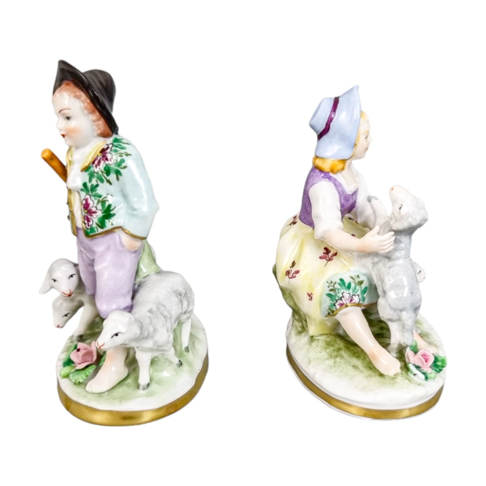 Miniature Sitzendorf porcelain boy and girl shepherds with sheep figurines