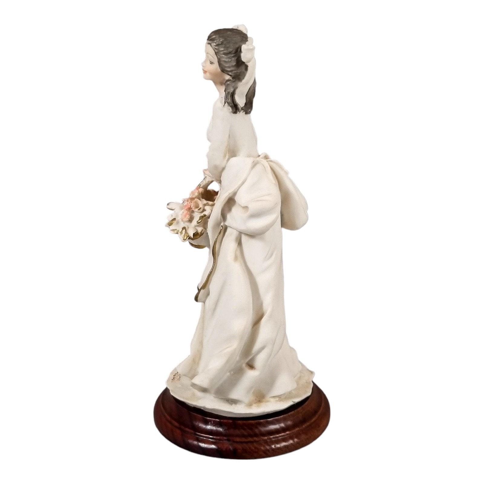 A. Belcari Capodimonte figurine of a young woman holding a flower basket