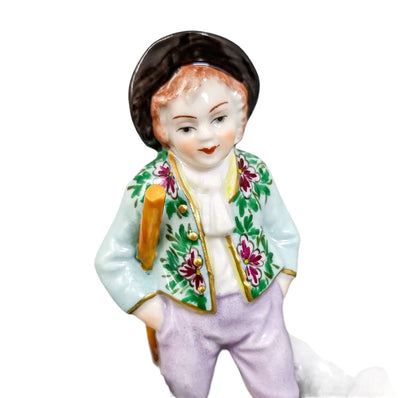 Miniature Sitzendorf porcelain boy and girl shepherds with sheep figurines