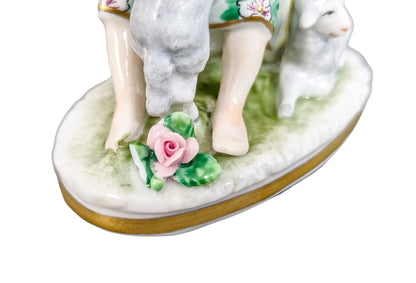 Miniature Sitzendorf porcelain boy and girl shepherds with sheep figurines