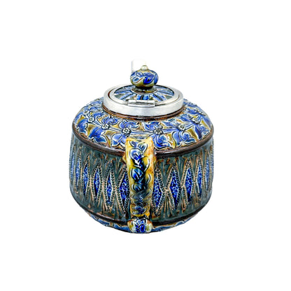 Rare Doulton Lambeth Aesthetic Movement stoneware teapot with sterling silver mounts, Birmingham 1880
