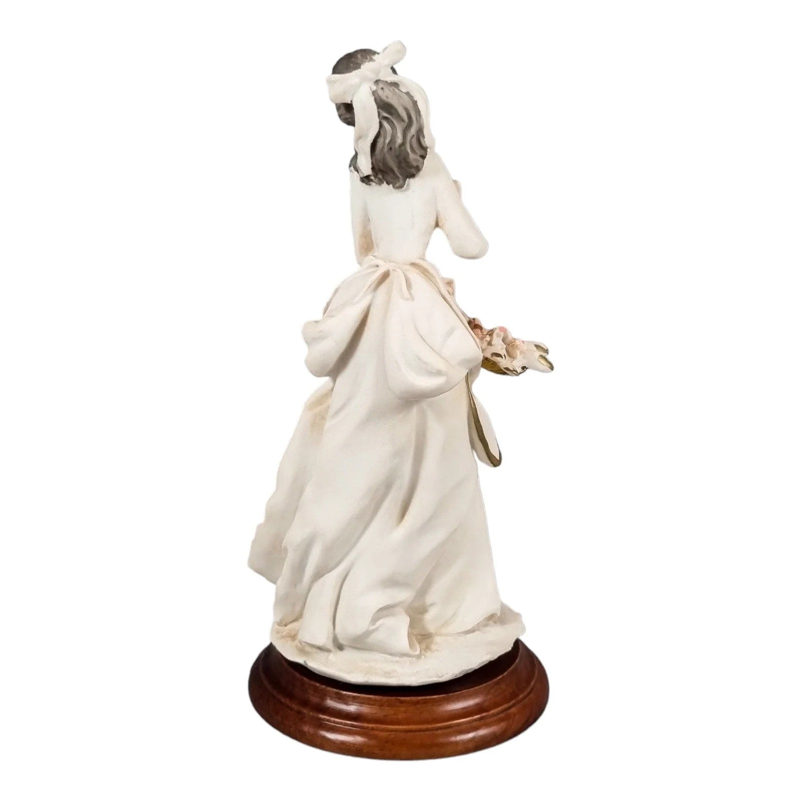 A. Belcari Capodimonte figurine of a young woman holding a flower basket