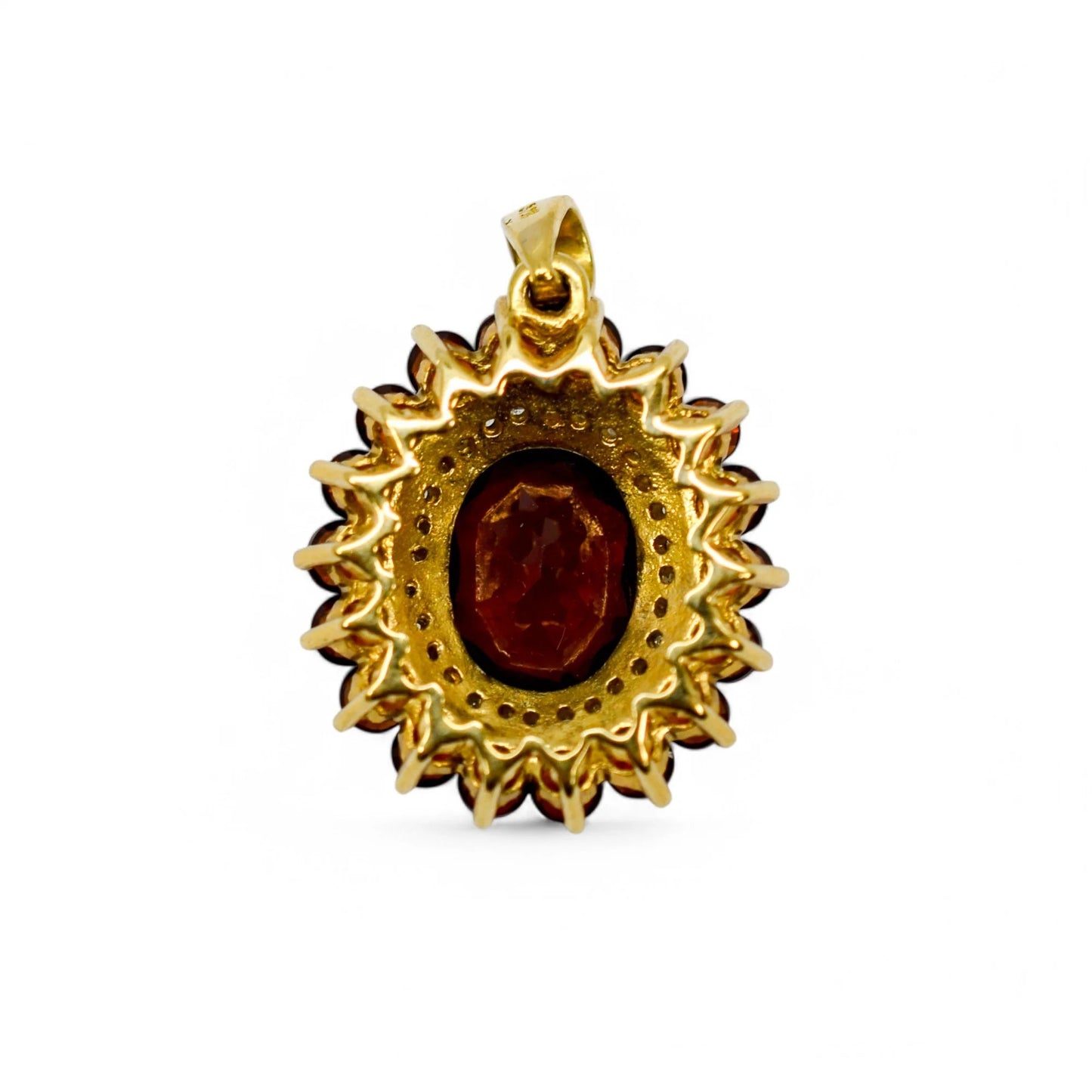 Vintage 9ct gold pendant with oval garnet, diamond halo, and garnet cluster