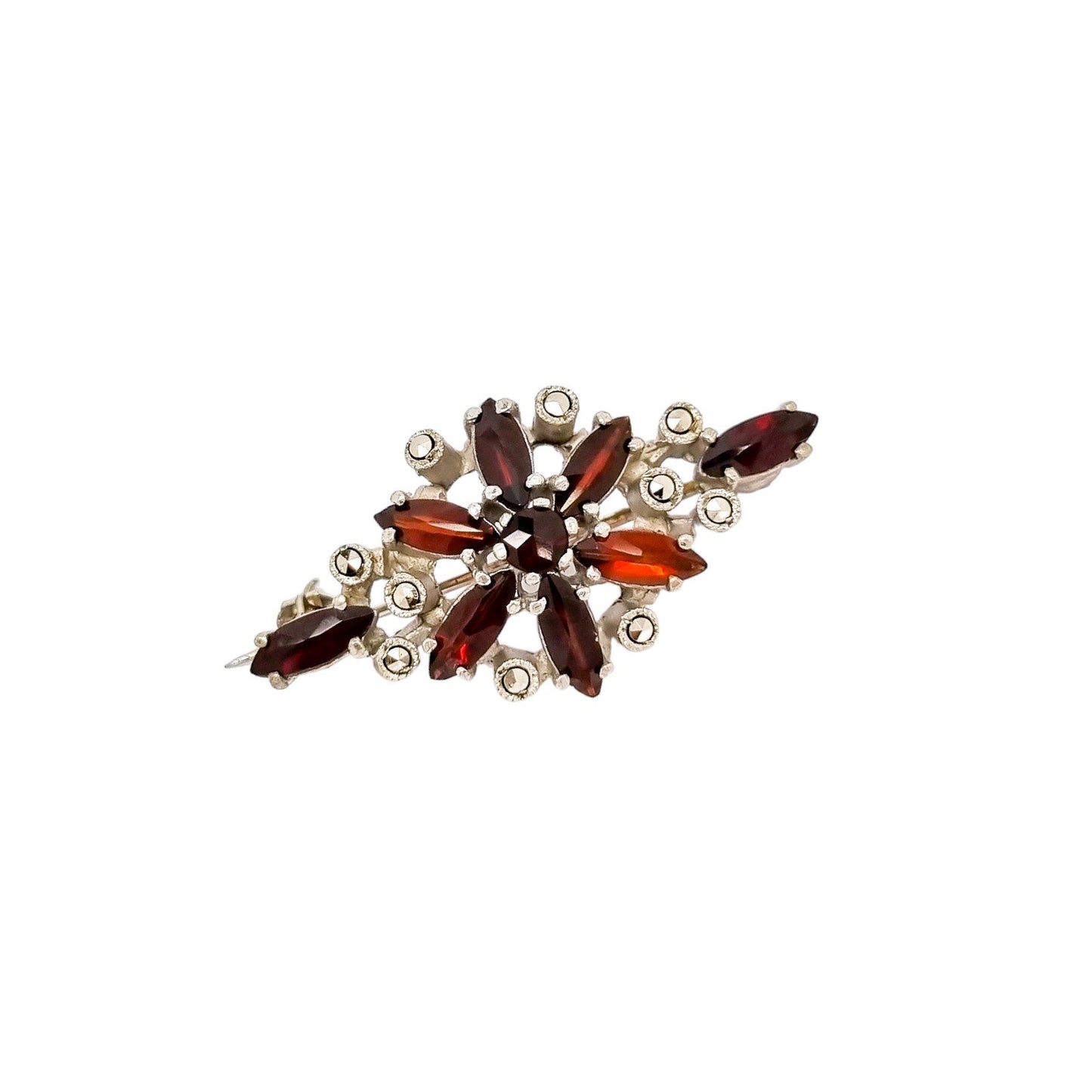 Art Deco openwork silver floral brooch set with red garnets and marcasites
