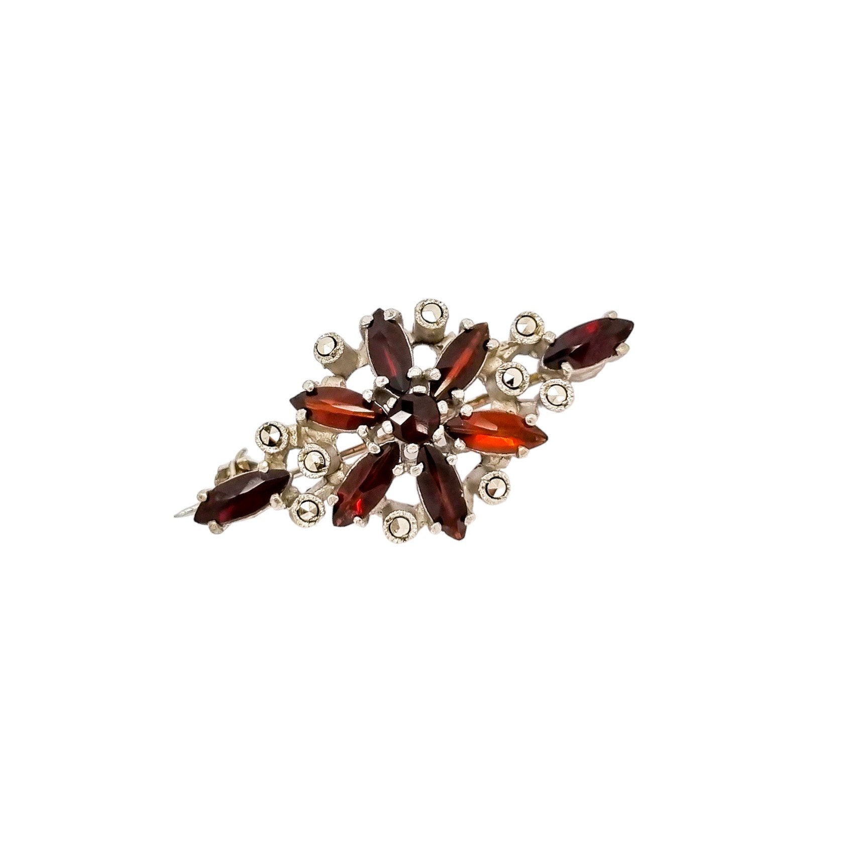 Art Deco openwork silver floral brooch set with red garnets and marcasites