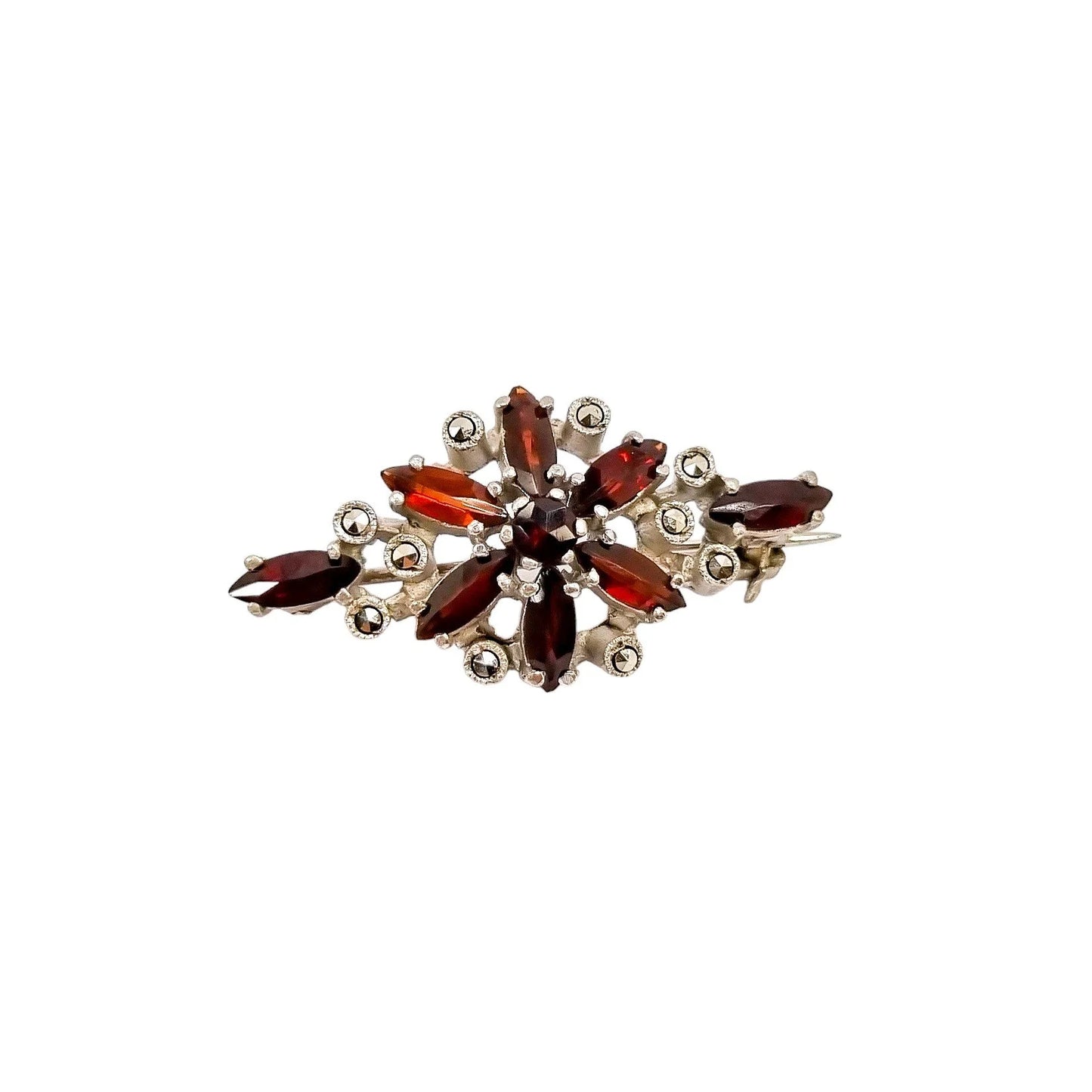 Art Deco openwork silver floral brooch set with red garnets and marcasites
