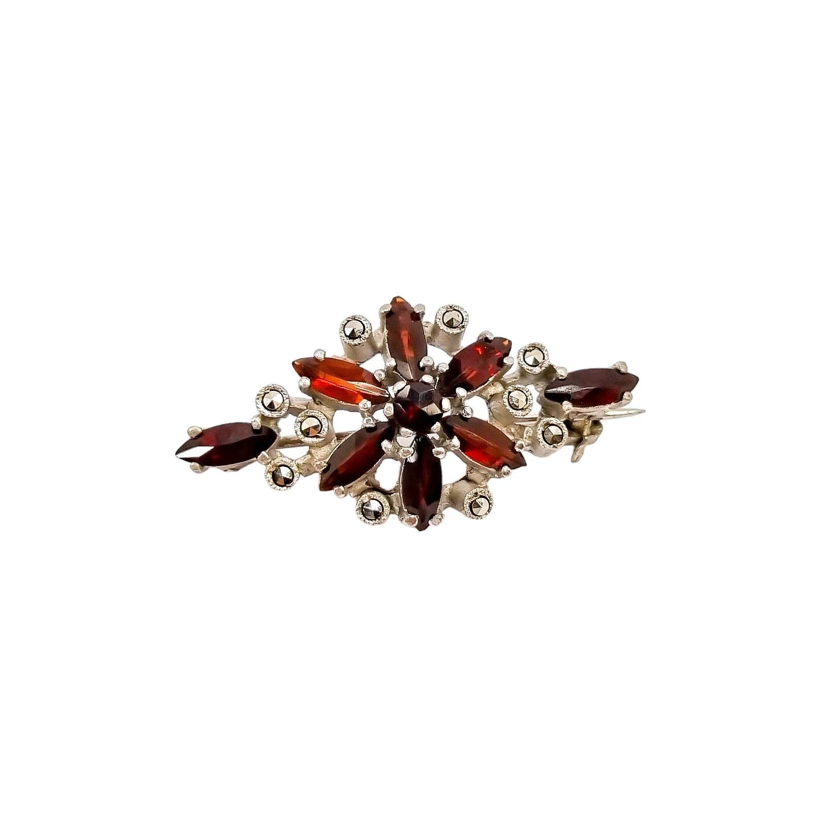 Art Deco openwork silver floral brooch set with red garnets and marcasites