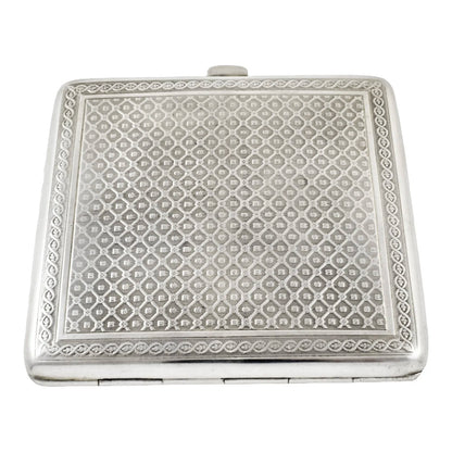 German Art Deco Louis Kuppenheim gilt, silver and enamel engine-turned cigarette case