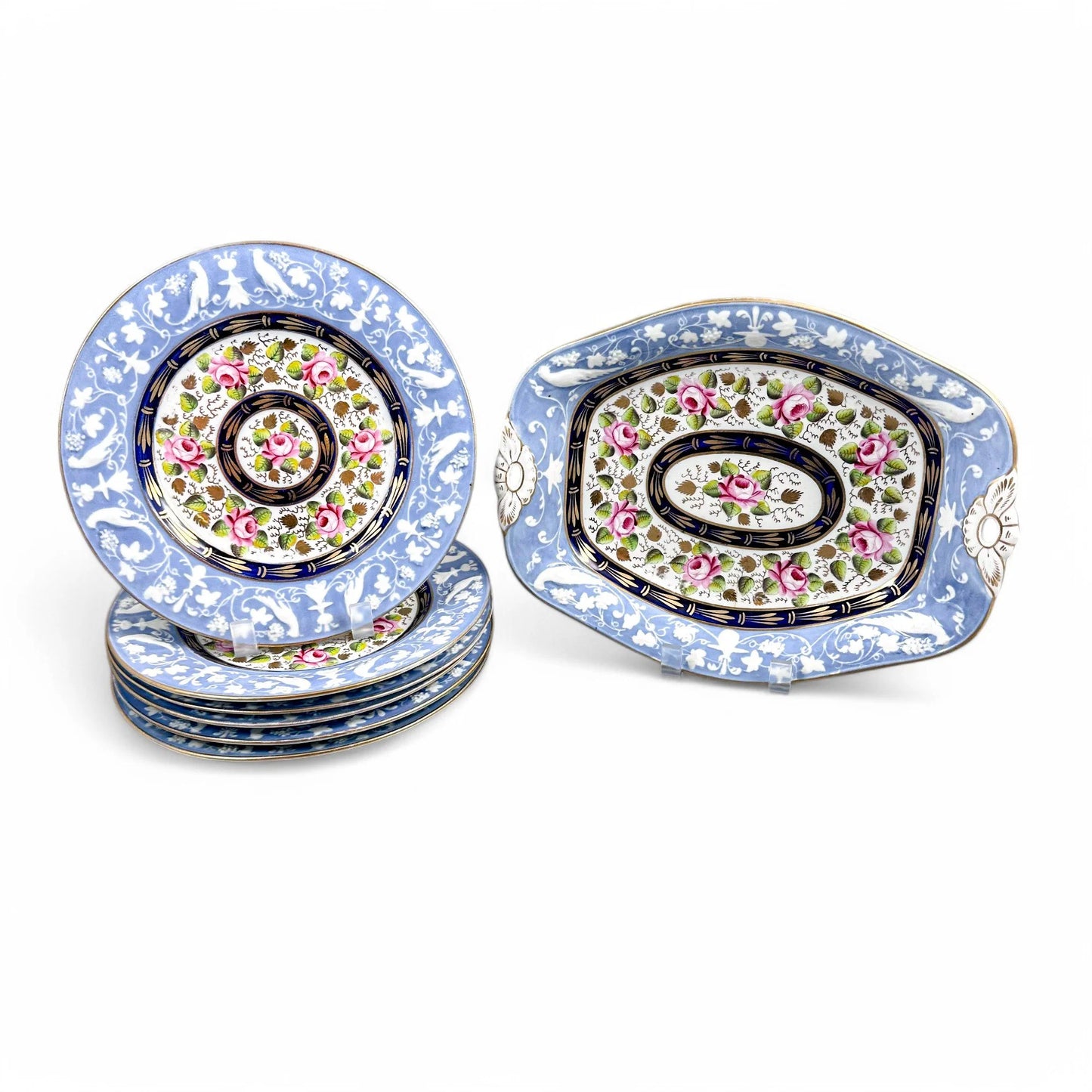Rare New Hall Staffordshire hybrid porcelain dessert service with powder blue and rose decoration, circa 1820