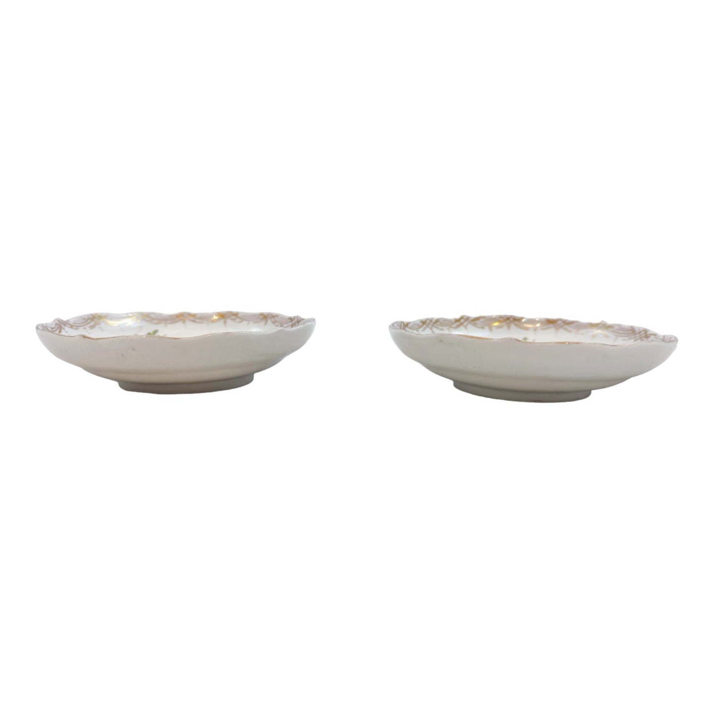 19th century Meissen porcelain pair of small floral saucers with gilt scalloped rims