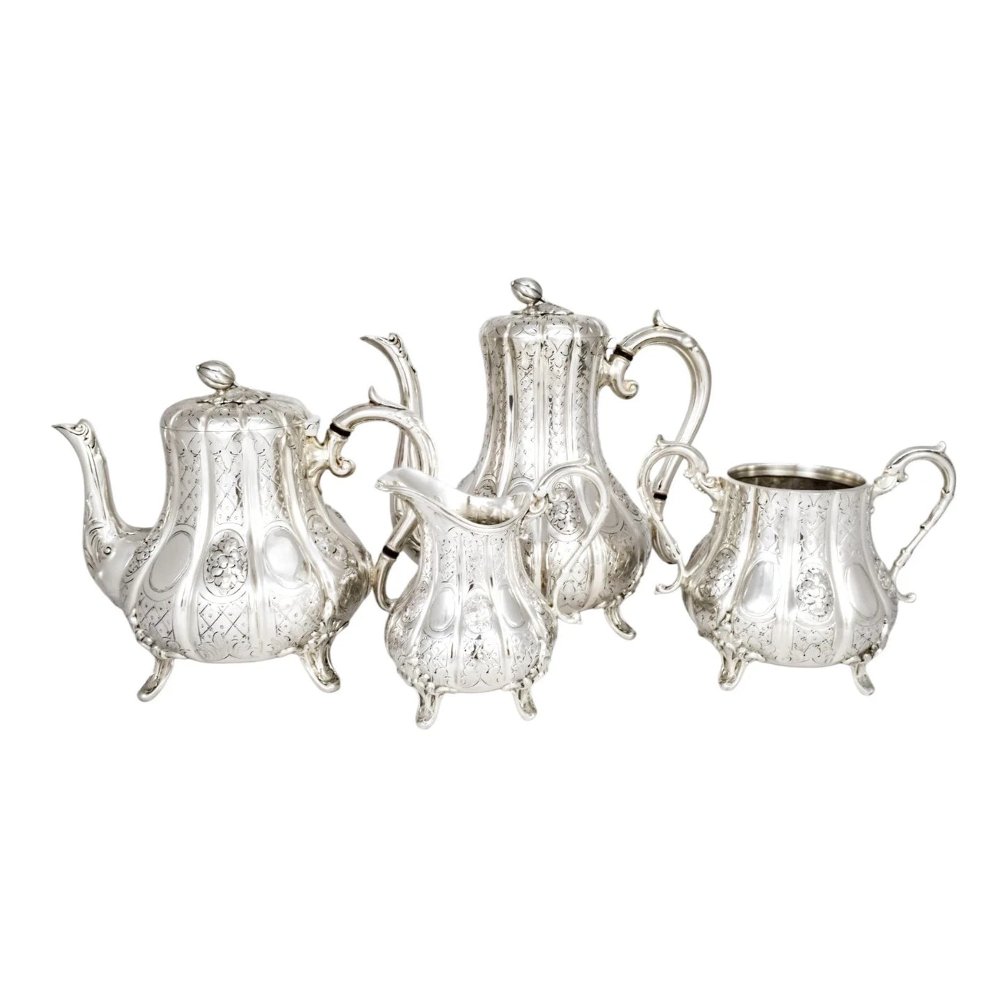 1860’s silverplate 4 piece tea and coffee set with nut finials and embossed flowers