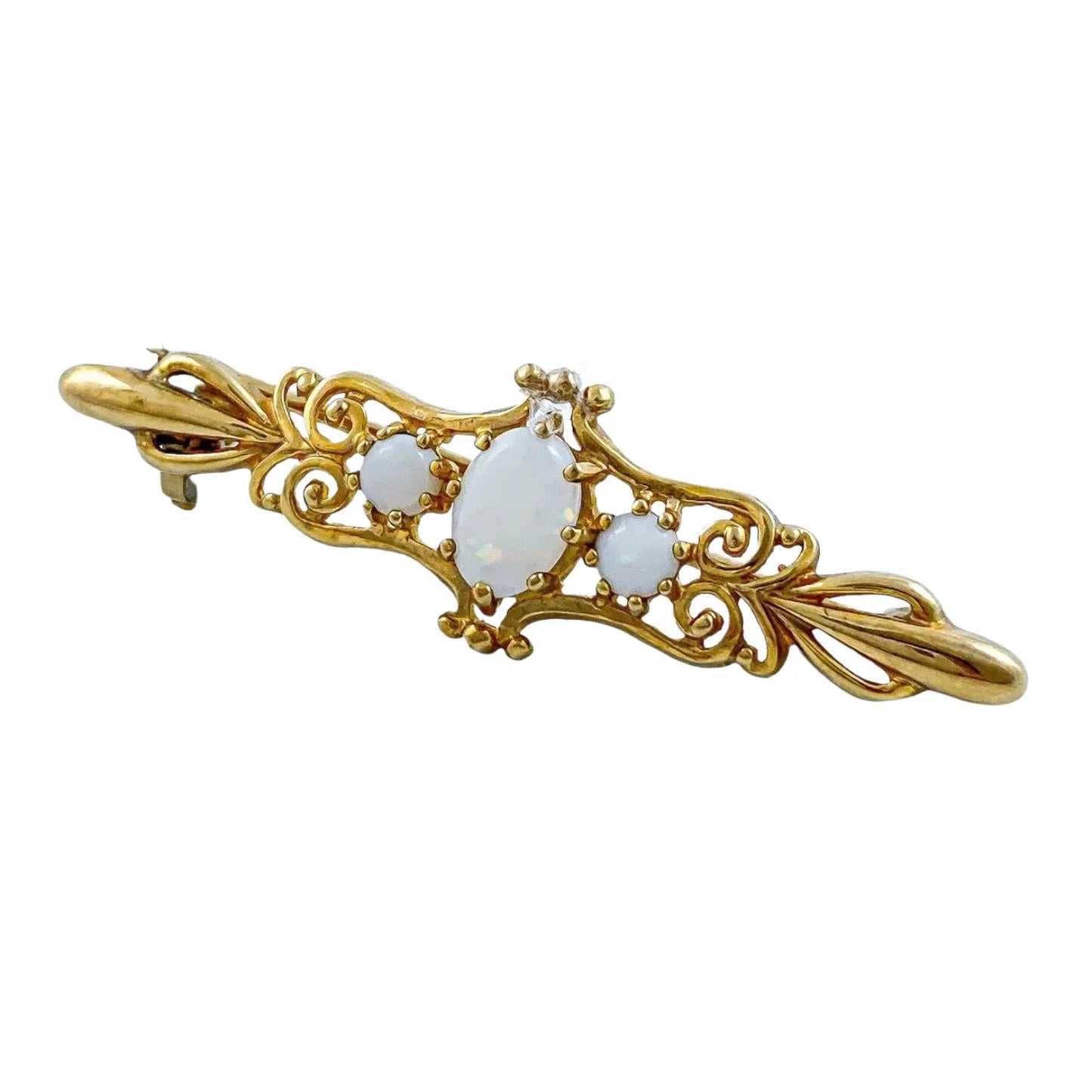 Art Nouveau style yellow gold brooch set with cabochon opals in a scrolling design