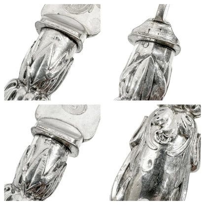 Mid-Victorian sterling silver fish server set embossed with Renaissance sea monsters