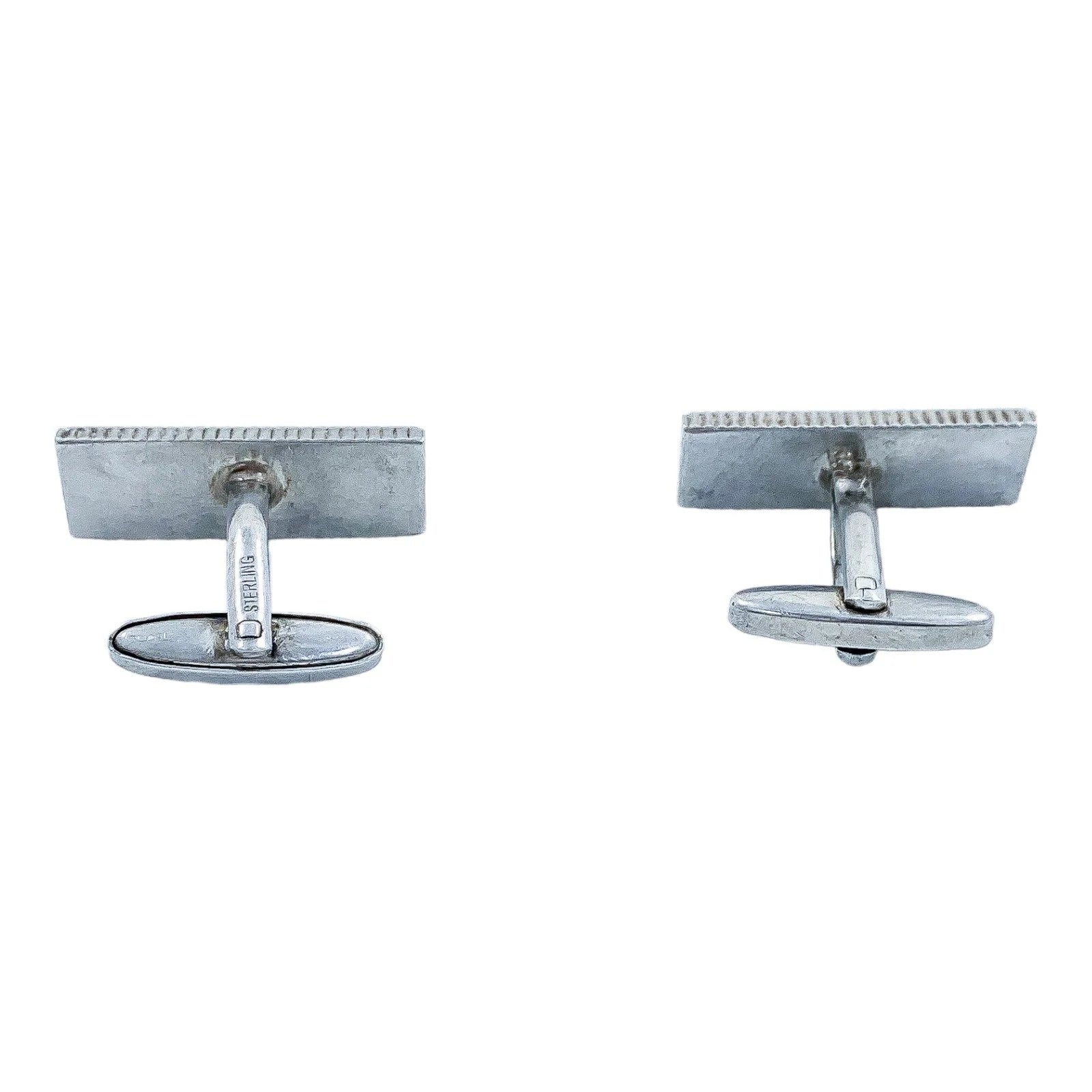 Two pairs of vintage gentlemen's sterling silver cufflinks, pink gold and “Groom” set