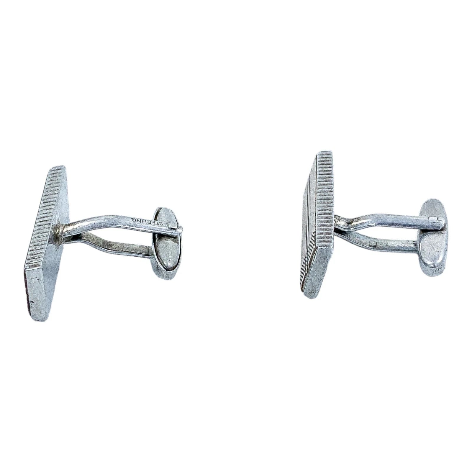 Two pairs of vintage gentlemen's sterling silver cufflinks, pink gold and “Groom” set