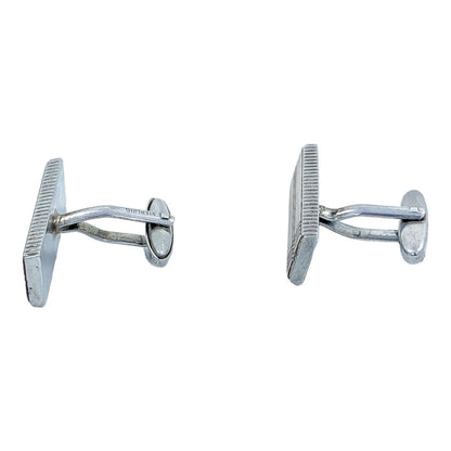 Two pairs of vintage gentlemen's sterling silver cufflinks, pink gold and “Groom” set