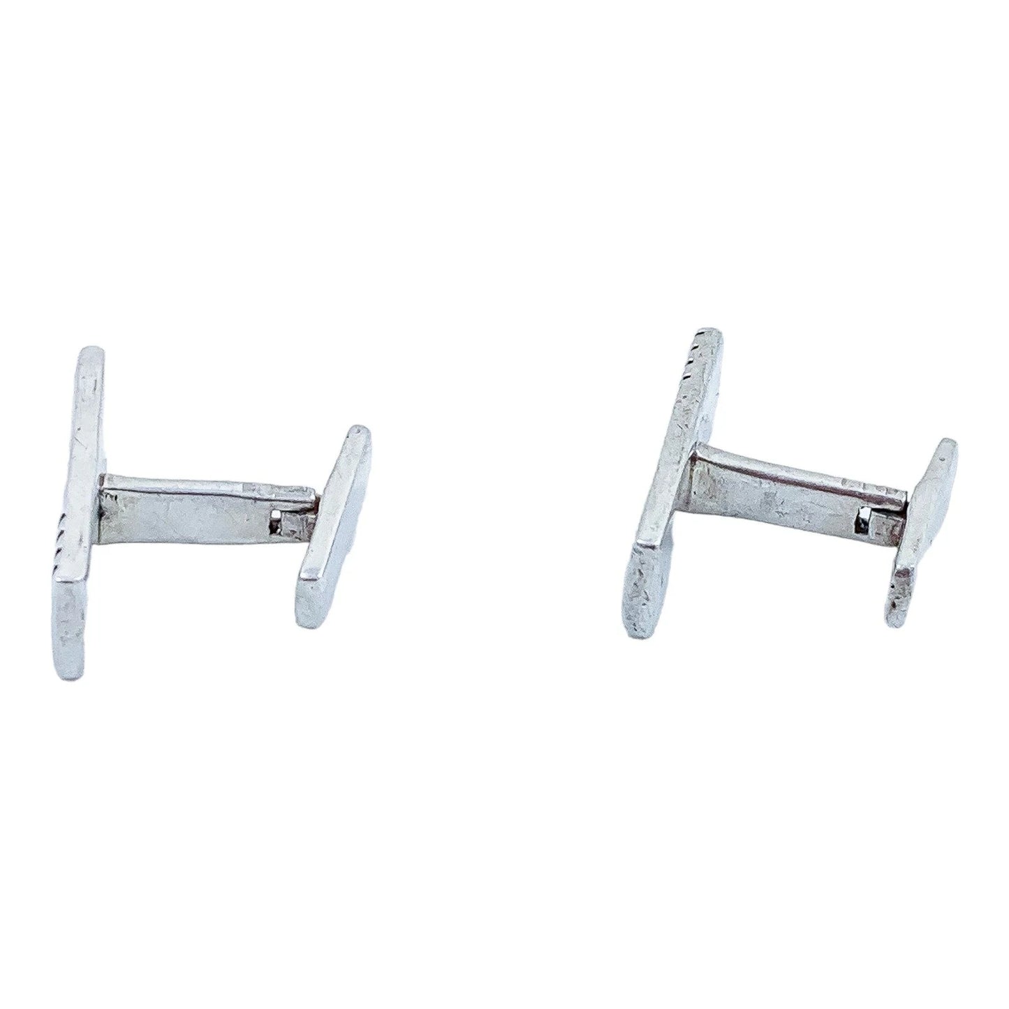 Two pairs of vintage gentlemen's sterling silver cufflinks, pink gold and “Groom” set