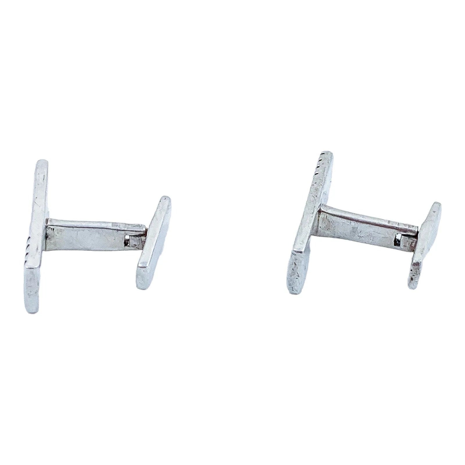 Two pairs of vintage gentlemen's sterling silver cufflinks, pink gold and “Groom” set