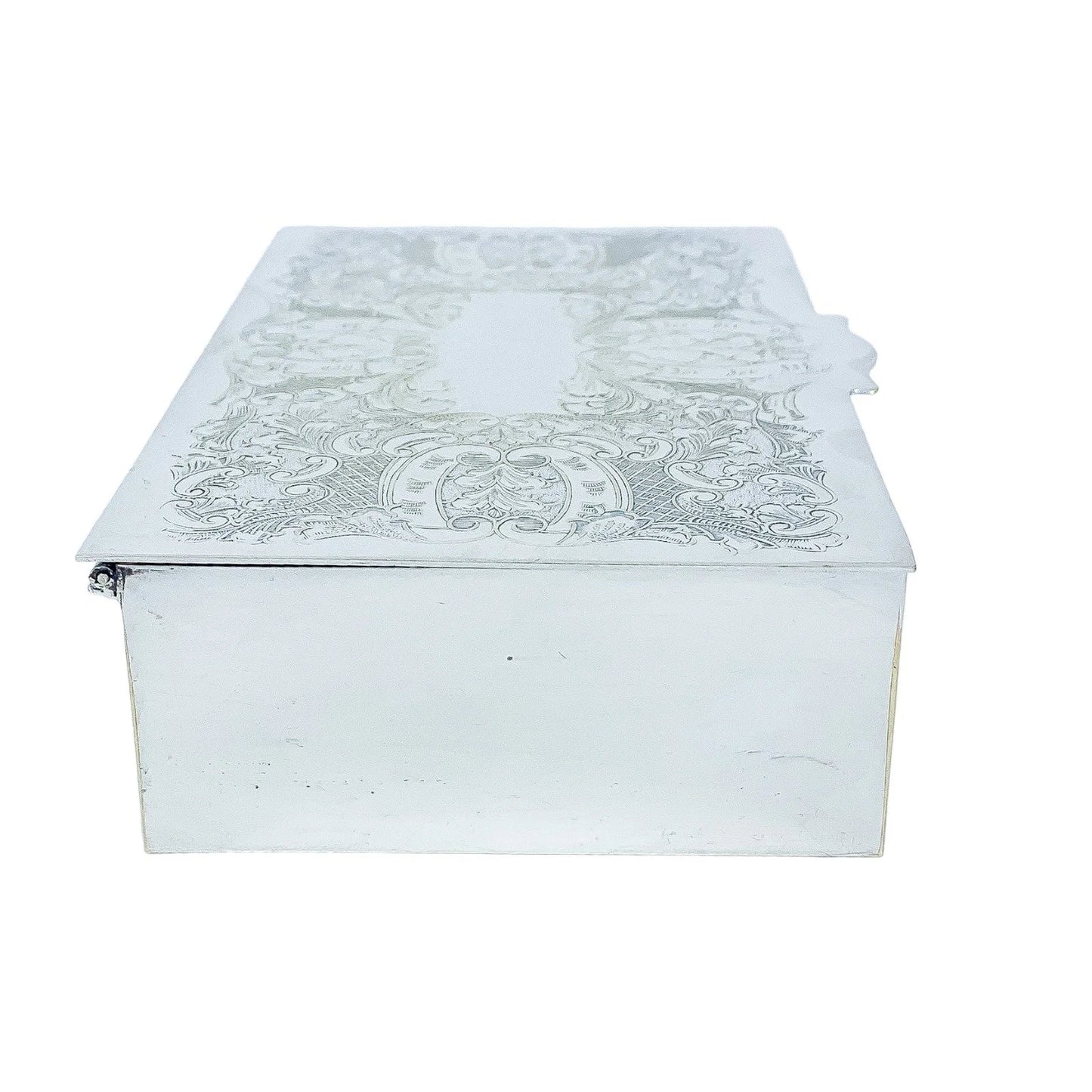 Large 1930's silver plated cigarette / jewellery box decorated with scrolls to lid