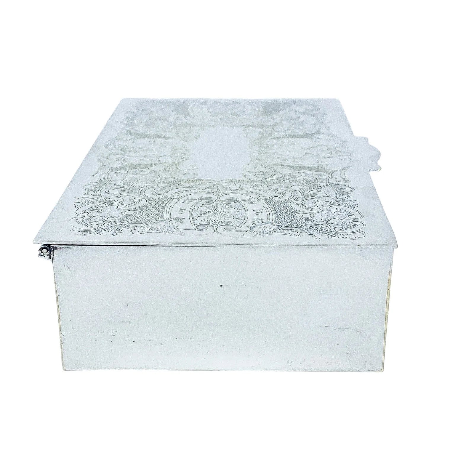 Large 1930's silver plated cigarette / jewellery box decorated with scrolls to lid