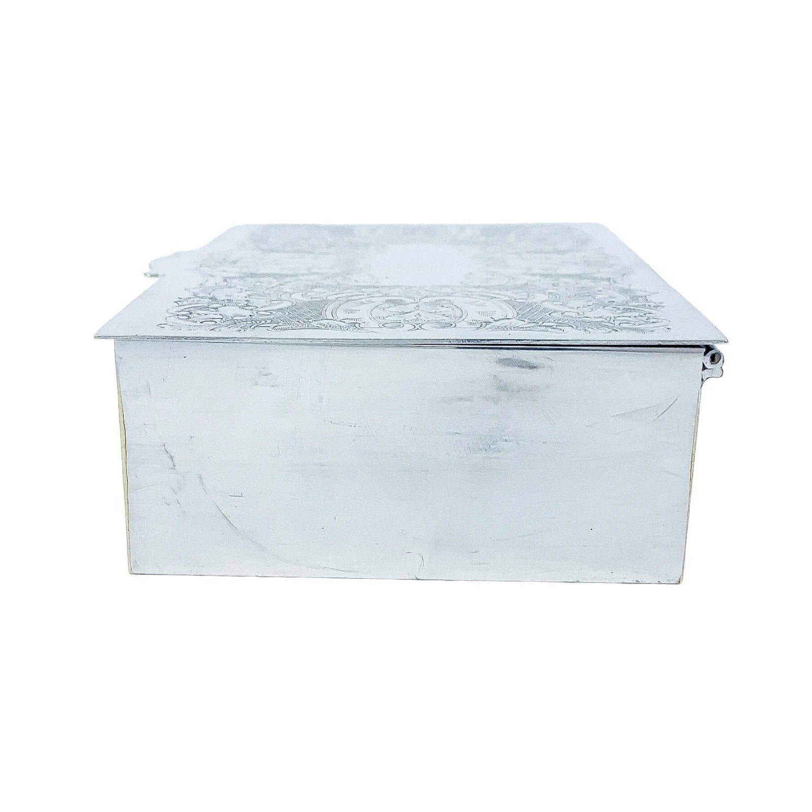 Large 1930's silver plated cigarette / jewellery box decorated with scrolls to lid