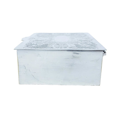 Large 1930's silver plated cigarette / jewellery box decorated with scrolls to lid