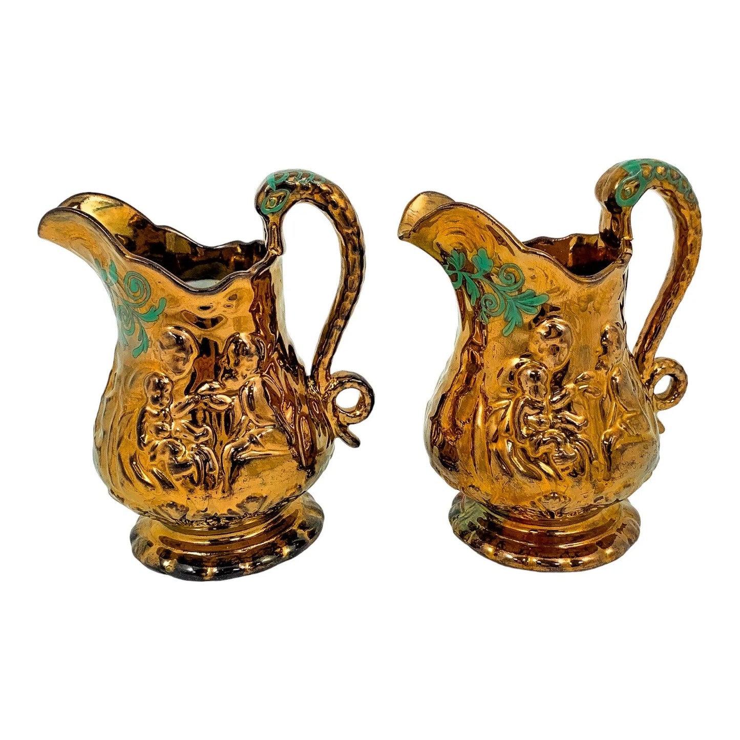 Pair of Victorian pottery copper lustreware moulded jugs / pitchers with religious scenes and snake handles