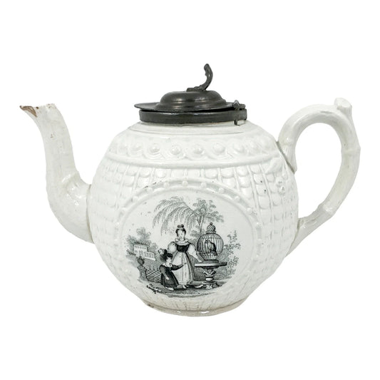 1820's Georgian moulded creamware teapot with black transfer print panels of lady with a birdcage