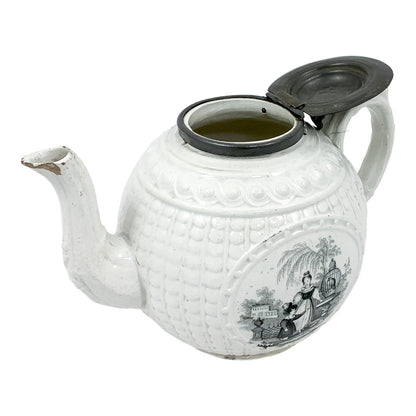 1820's Georgian moulded creamware teapot with black transfer print panels of lady with a birdcage