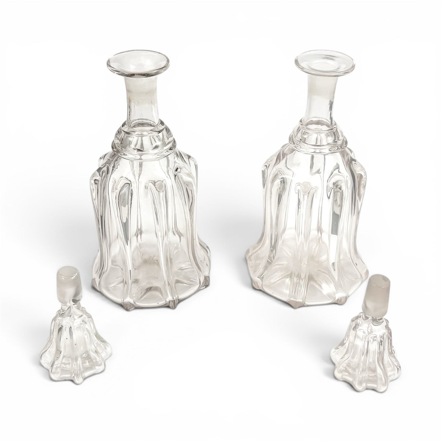Pair of Victorian pillar-moulded bell decanters with stoppers