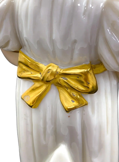 Royal Worcester sugar shaker in the form of a young girl