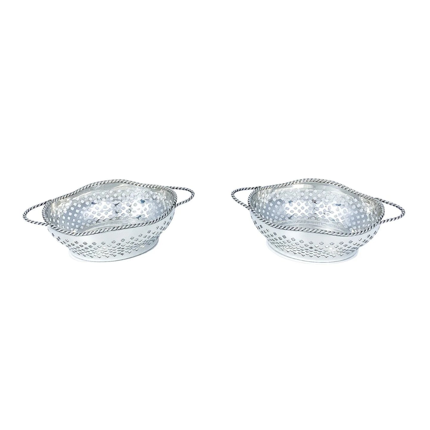 Edwardian sterling silver bonbon baskets with C-form handles and pierced geometric design
