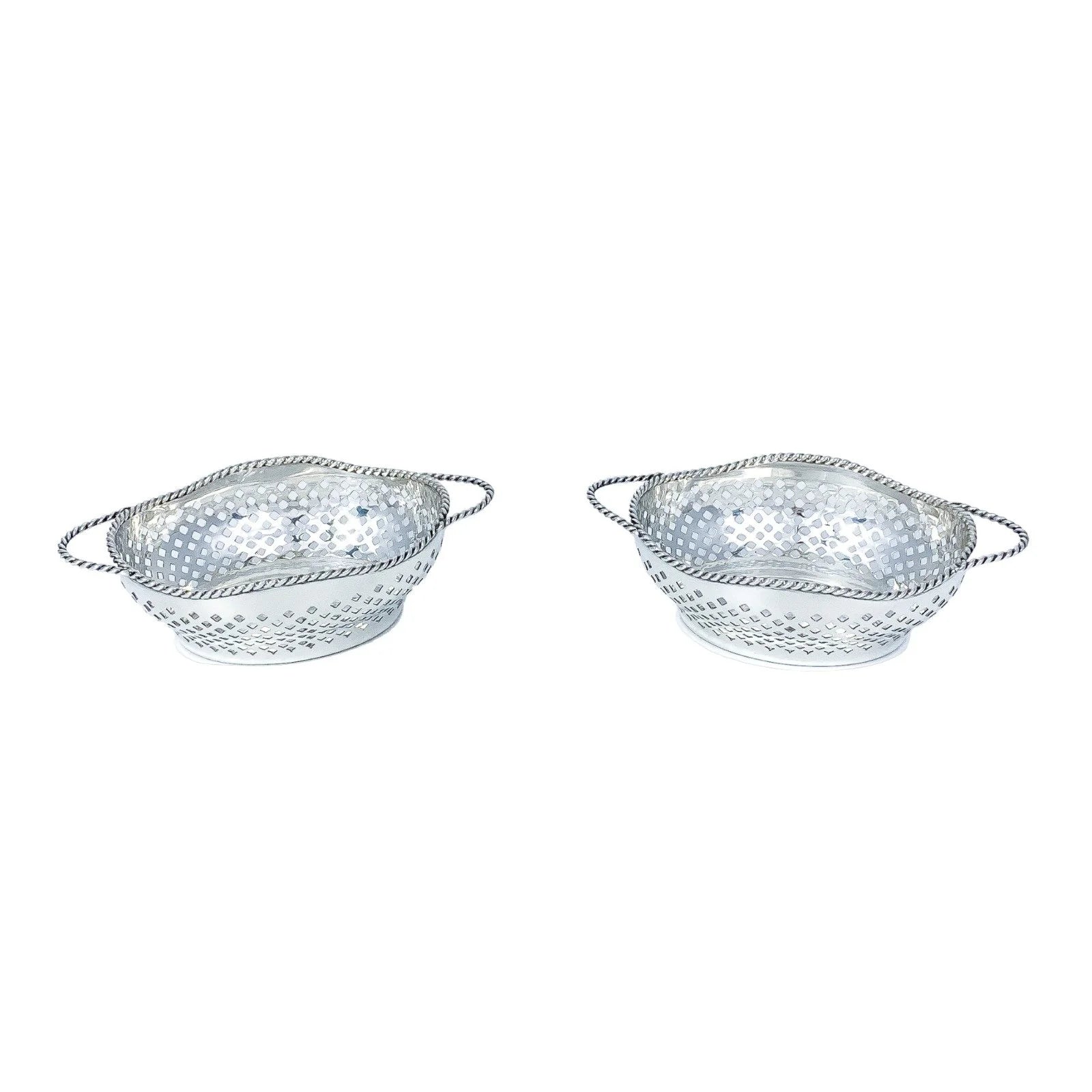 Edwardian sterling silver bonbon baskets with C-form handles and pierced geometric design