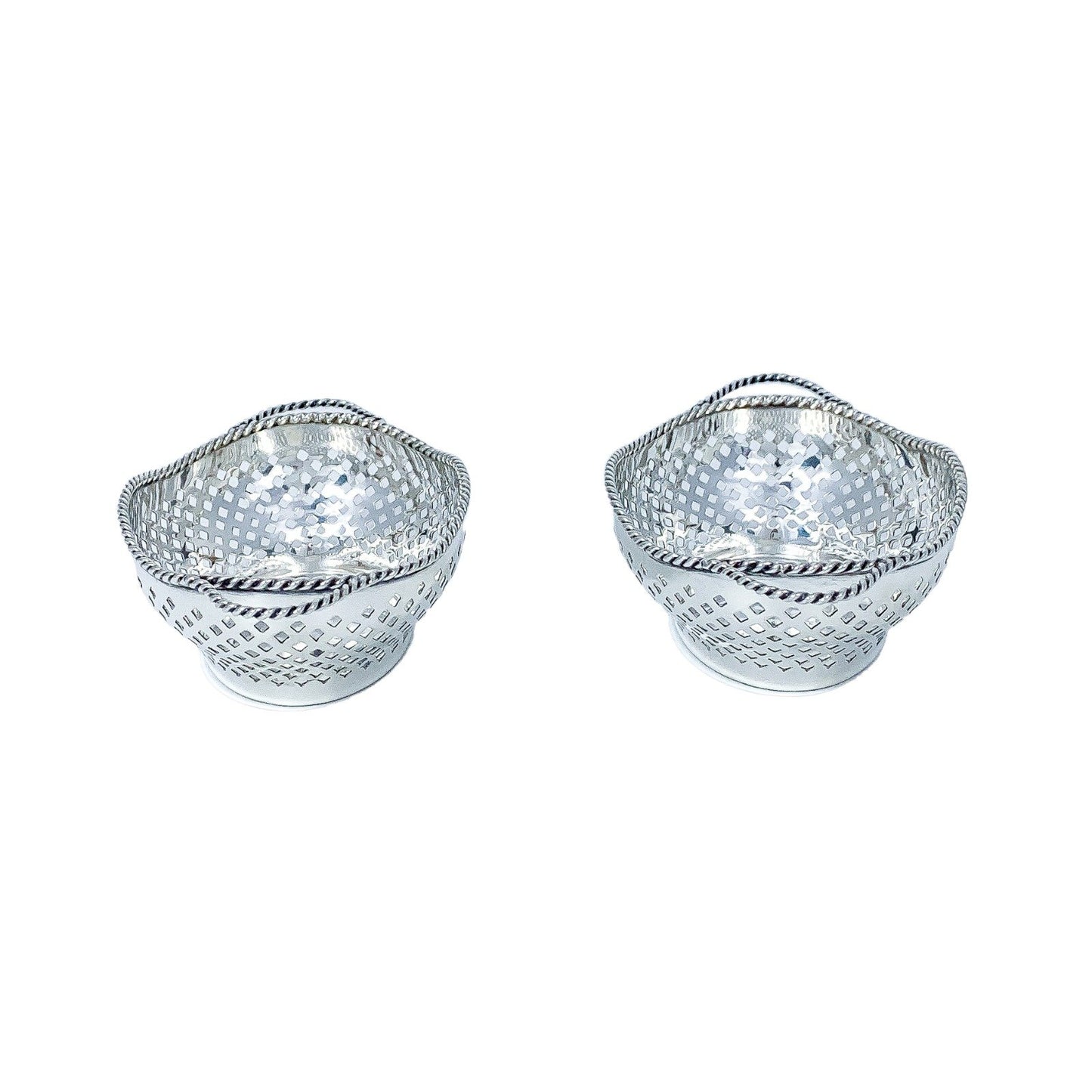 Edwardian sterling silver bonbon baskets with C-form handles and pierced geometric design