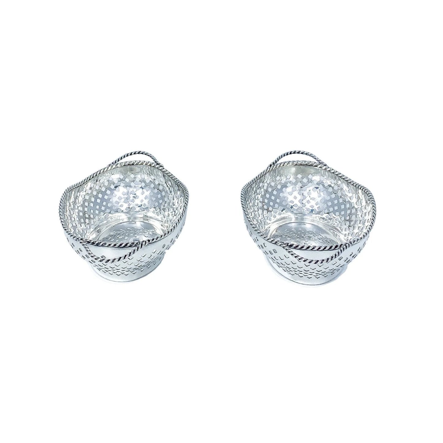 Edwardian sterling silver bonbon baskets with C-form handles and pierced geometric design