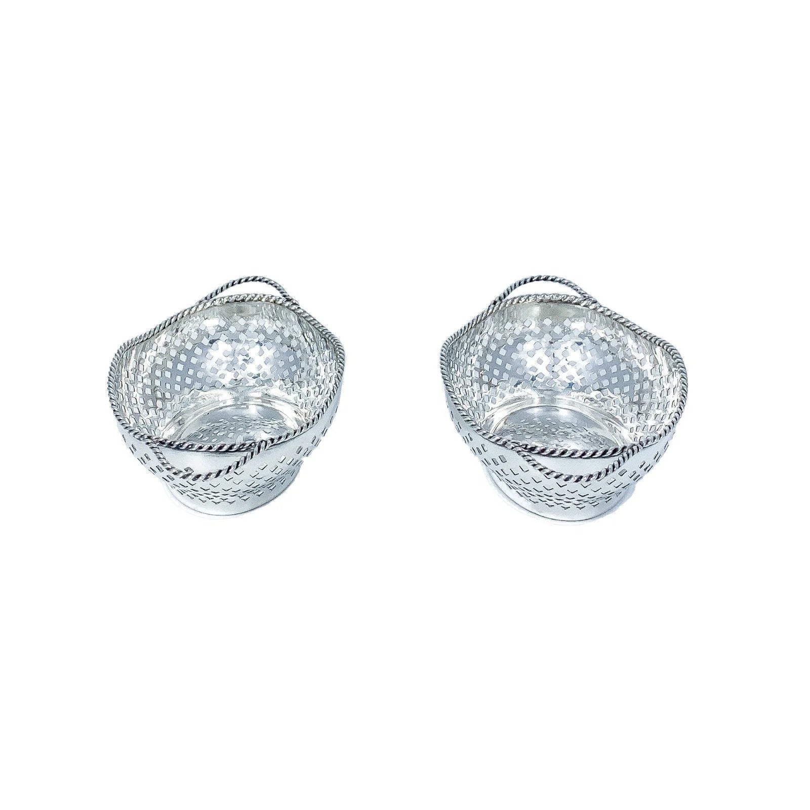 Edwardian sterling silver bonbon baskets with C-form handles and pierced geometric design