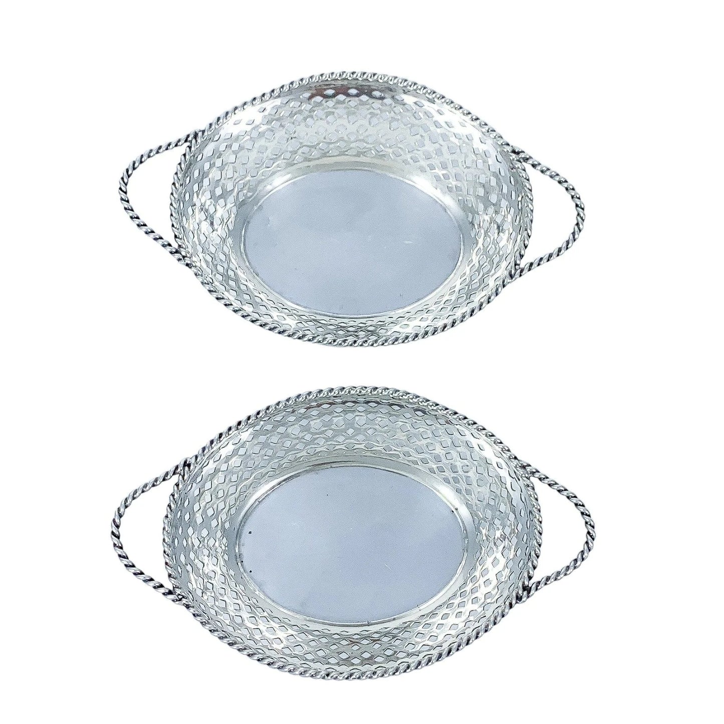 Edwardian sterling silver bonbon baskets with C-form handles and pierced geometric design