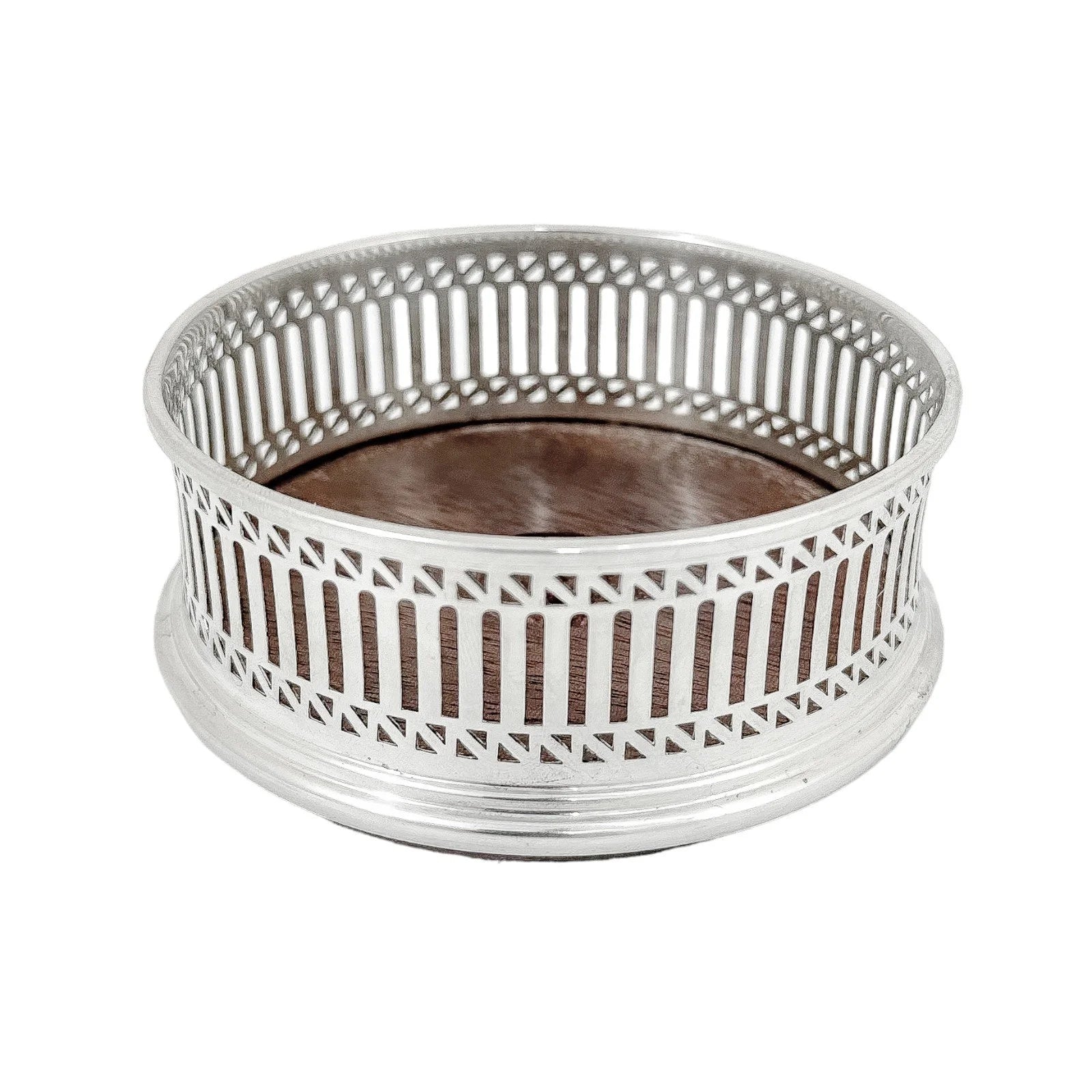 Victorian style mahogany and sterling silver bottle coaster with pierced border