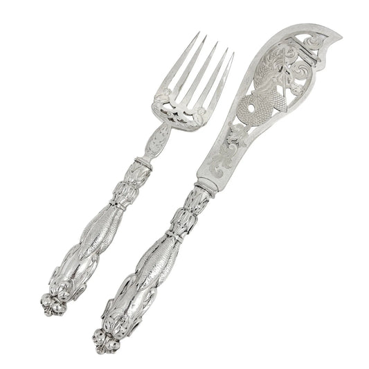 Mid-Victorian sterling silver fish server set embossed with Renaissance sea monsters