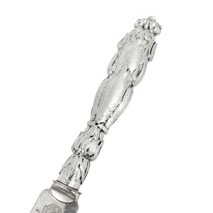 Mid-Victorian sterling silver fish server set embossed with Renaissance sea monsters