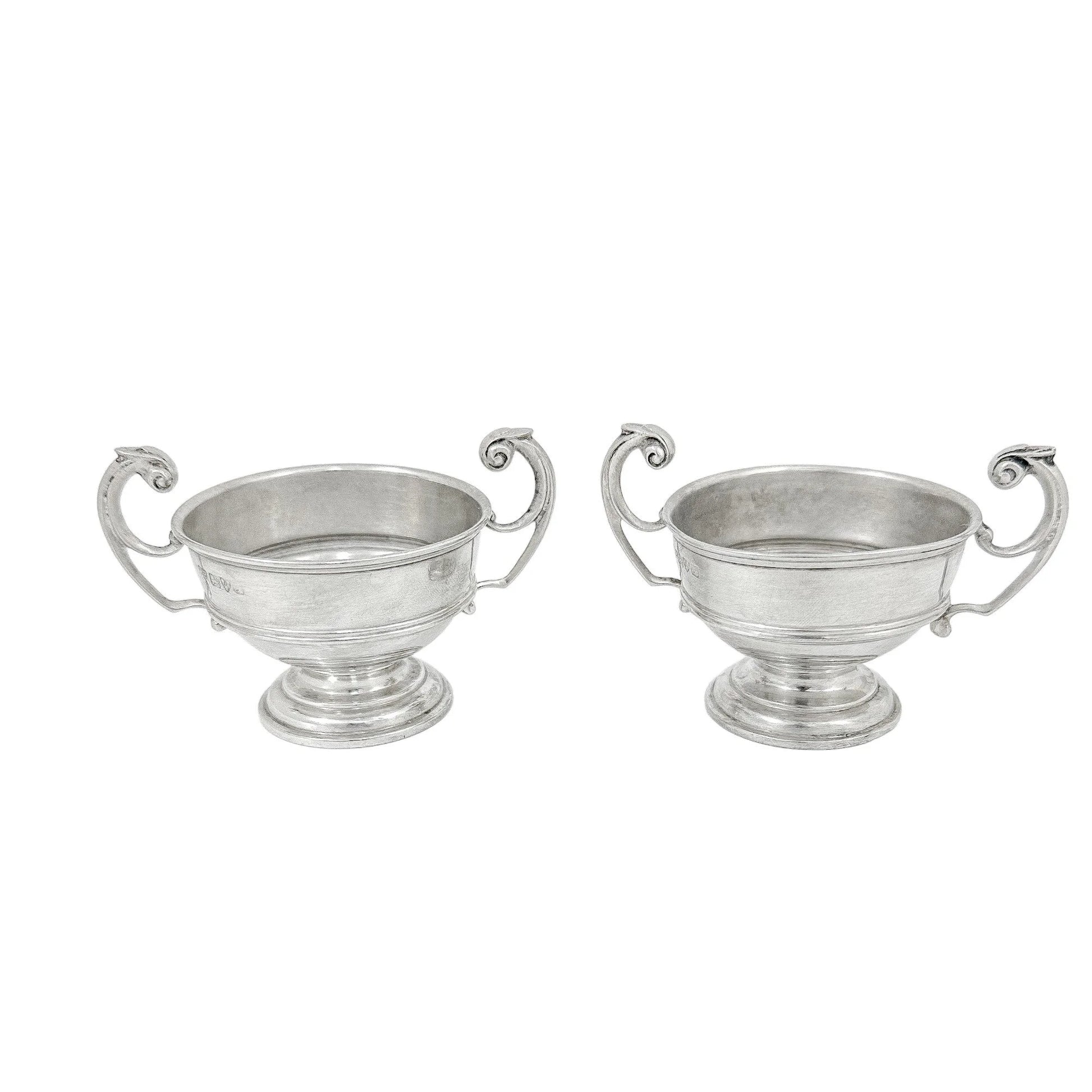 Pair of sterling silver Edwardian two handled bowls / trophy cups