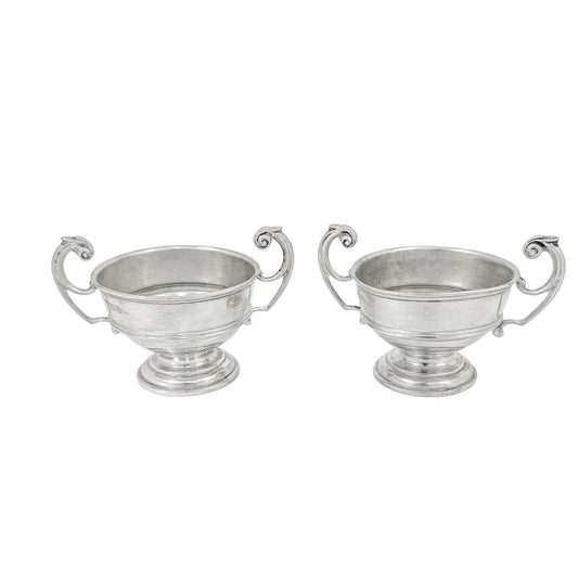 Pair of sterling silver Edwardian two handled bowls / trophy cups