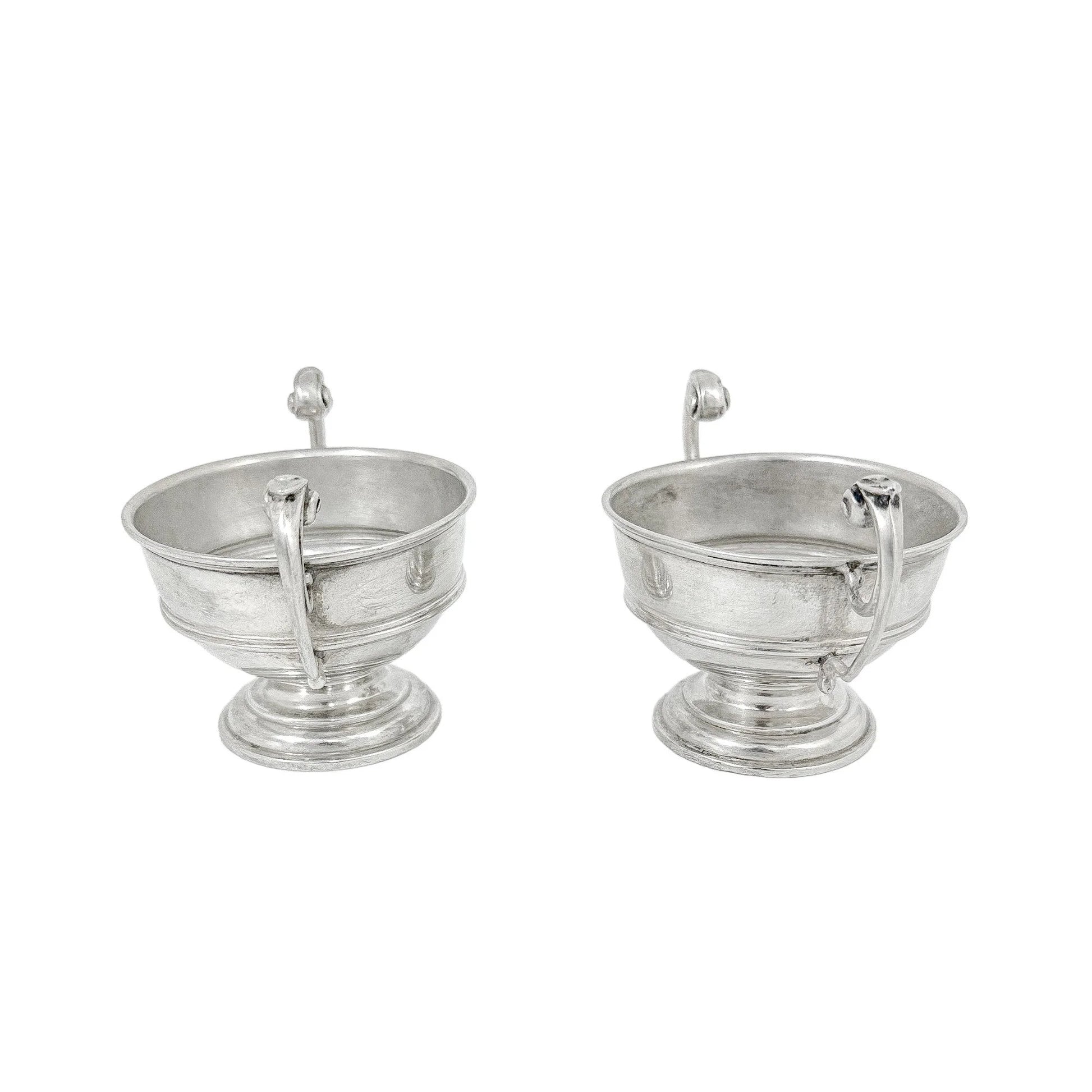 Pair of sterling silver Edwardian two handled bowls / trophy cups