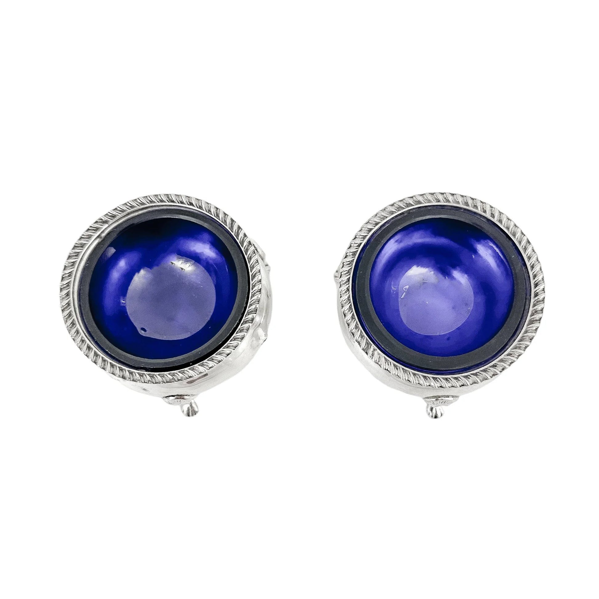 Pair of Edwardian sterling silver cauldron salt cellars with blue glass inserts