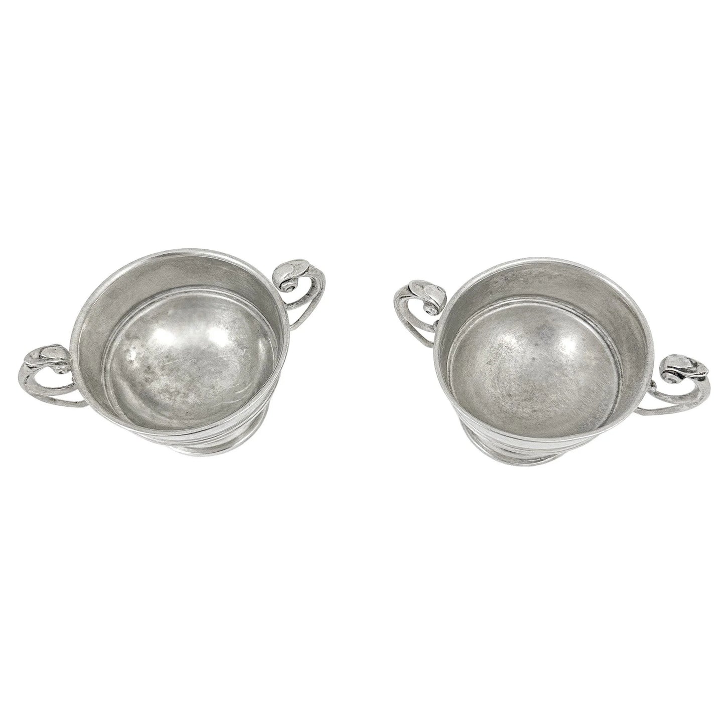 Pair of sterling silver Edwardian two handled bowls / trophy cups