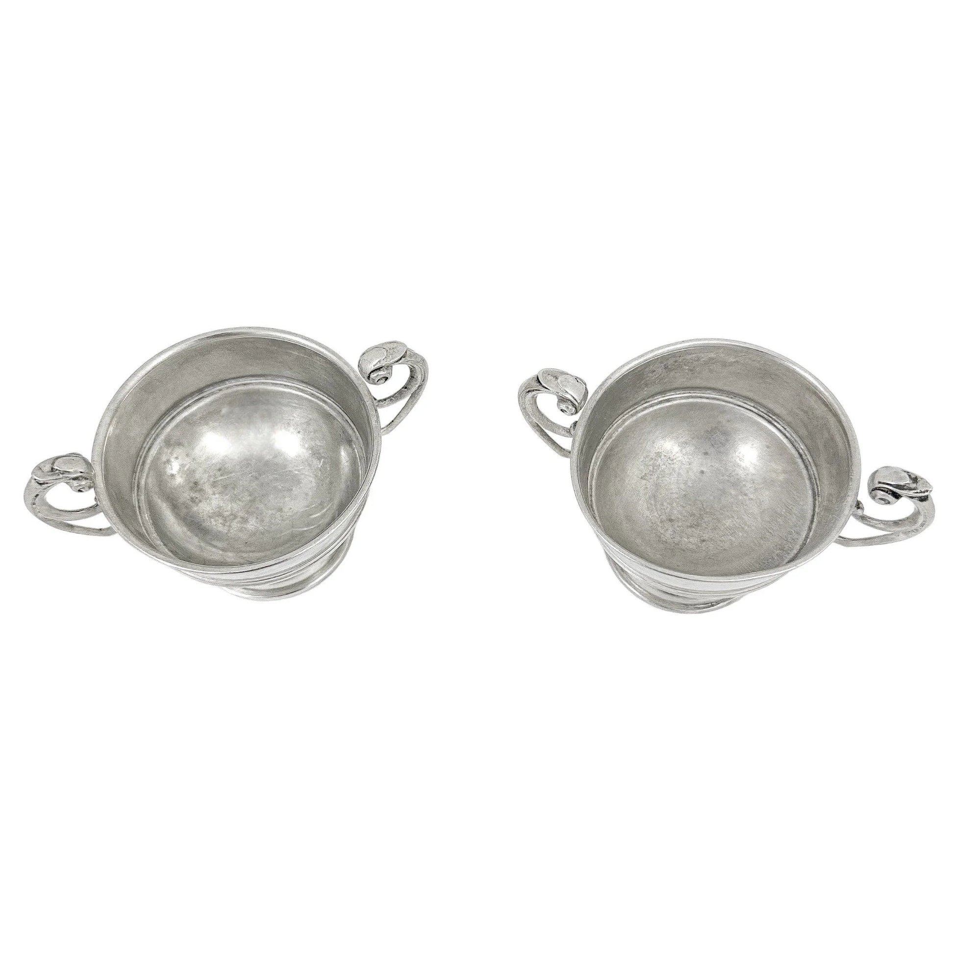 Pair of sterling silver Edwardian two handled bowls / trophy cups