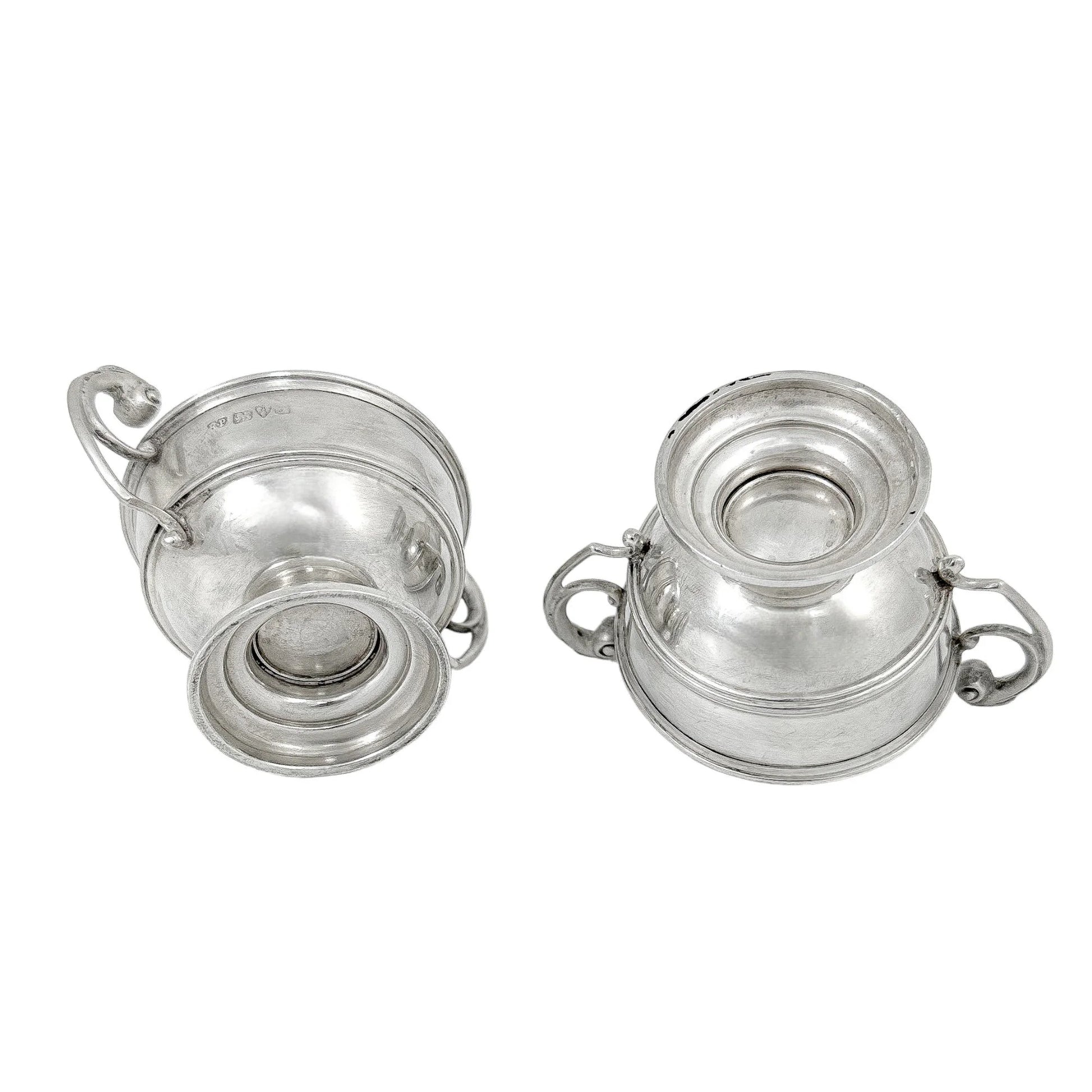 Pair of sterling silver Edwardian two handled bowls / trophy cups