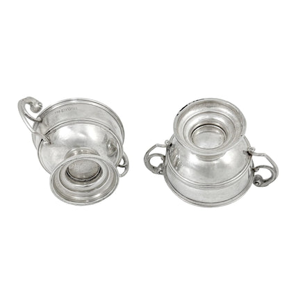 Pair of sterling silver Edwardian two handled bowls / trophy cups