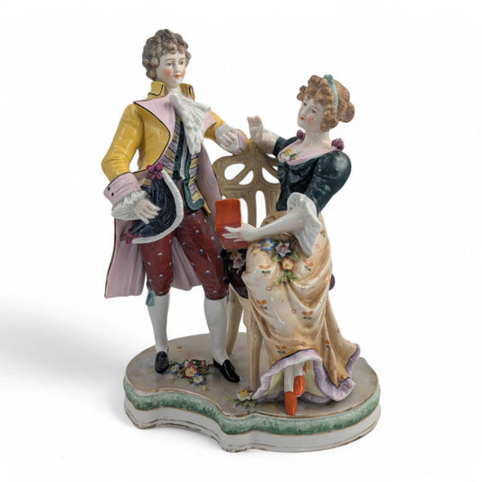 Late 19th century Sitzendorf porcelain courting couple figurine